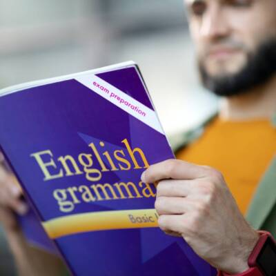 Man preparing for exam and repeating English grammar